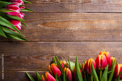 Fototapeta Naklejka Na Ścianę i Meble -  Tulips on wooden background.