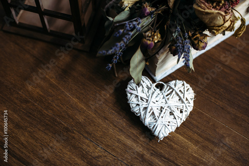 Decorative heart on a wooden background