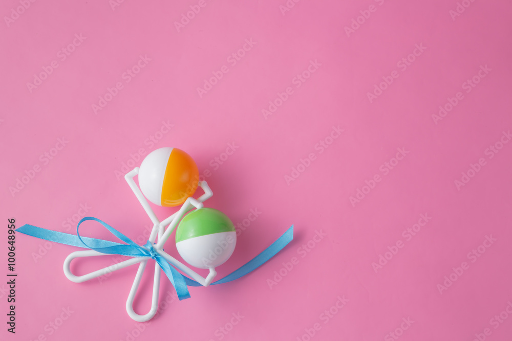 Baby toys on pink bakground. Baby toys on pink bakground.