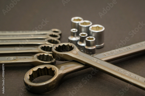 wrench, working wrench, wrench metal, set of wrenches, repair, tools, work on a gray  Textured Background, and build in composition