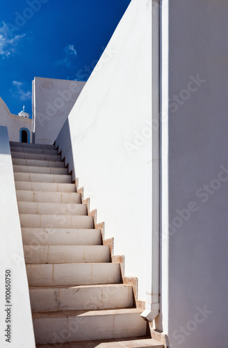 Stairs, white walls and a church. Astypalaia, Greek island