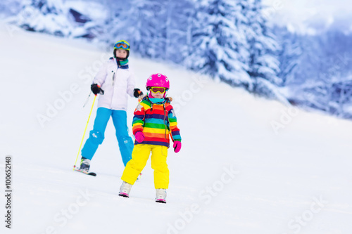 Kids skiing in the mountains