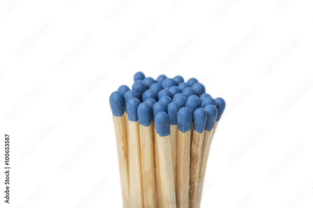 Group of blue matches on white