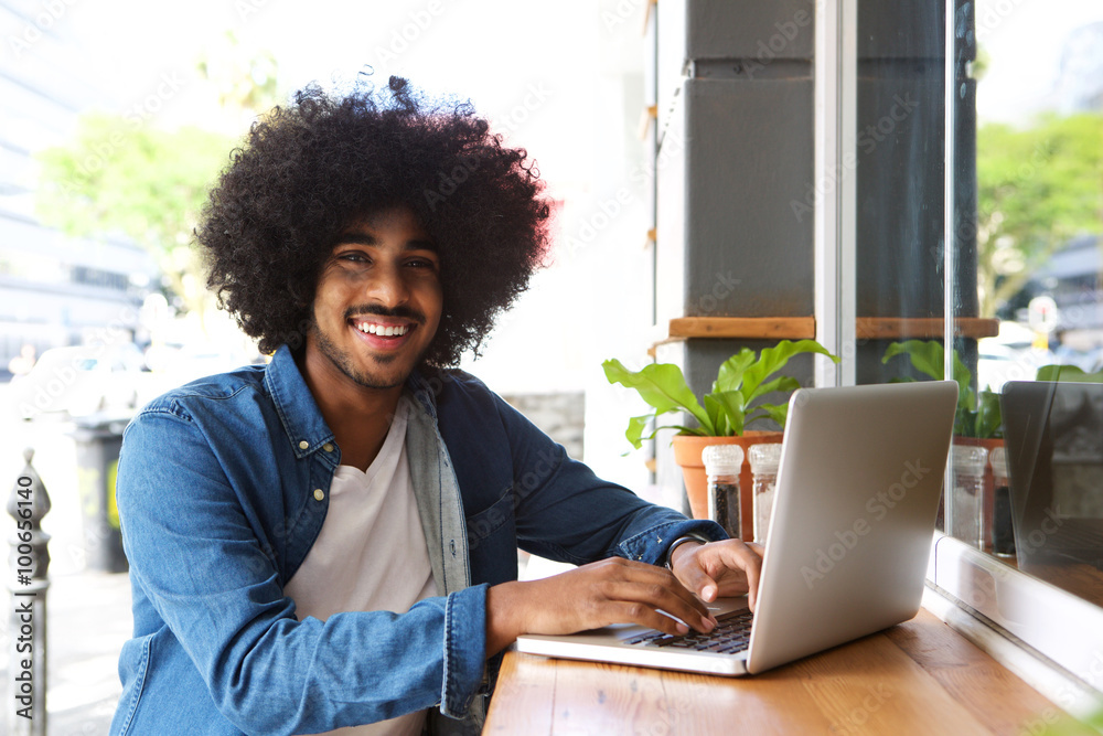 Cool guy working with laptop Cool guy working with laptop