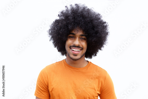 Smiling young man with afro photo