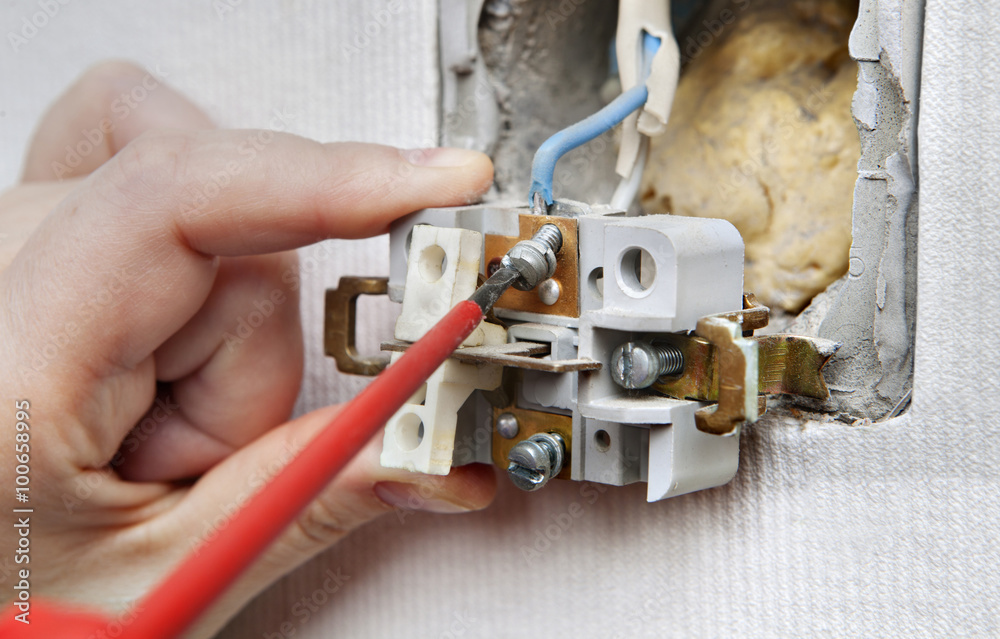 Changing Light Switch, Removing faulty device, close-up. Changing Light Switch, Removing faulty device, close-up.