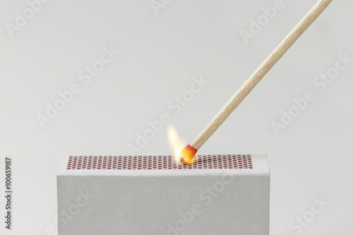 Match lit on a Matchbox