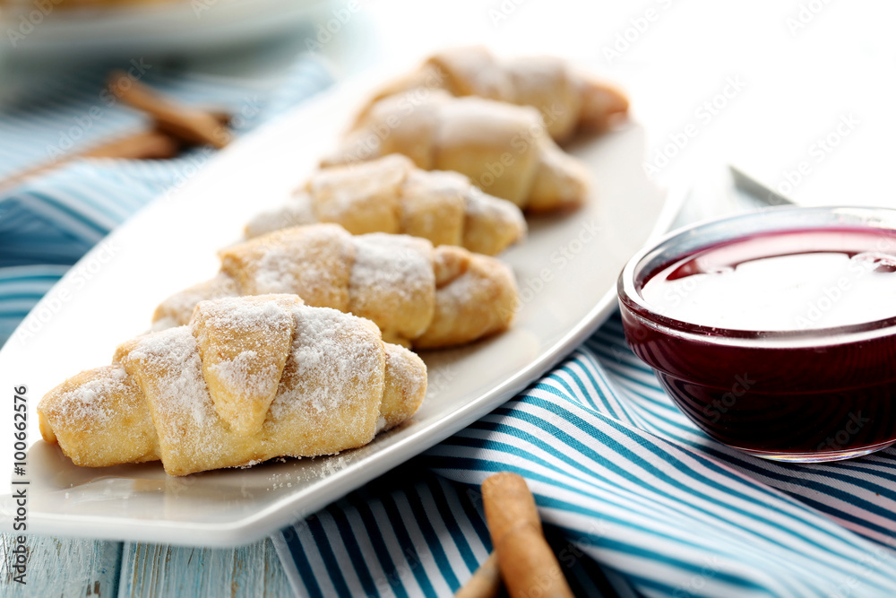 Fresh homemade croissants on a blue wooden table Fresh homemade croissants on a blue wooden table