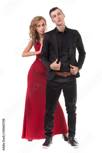 Young elegant couple dancing, isolated on white