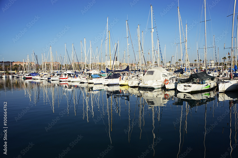 Barcelona, Spain - December 27, 2015: Port Olimpic marina in the city of Barcelona, Catalonia, Spain