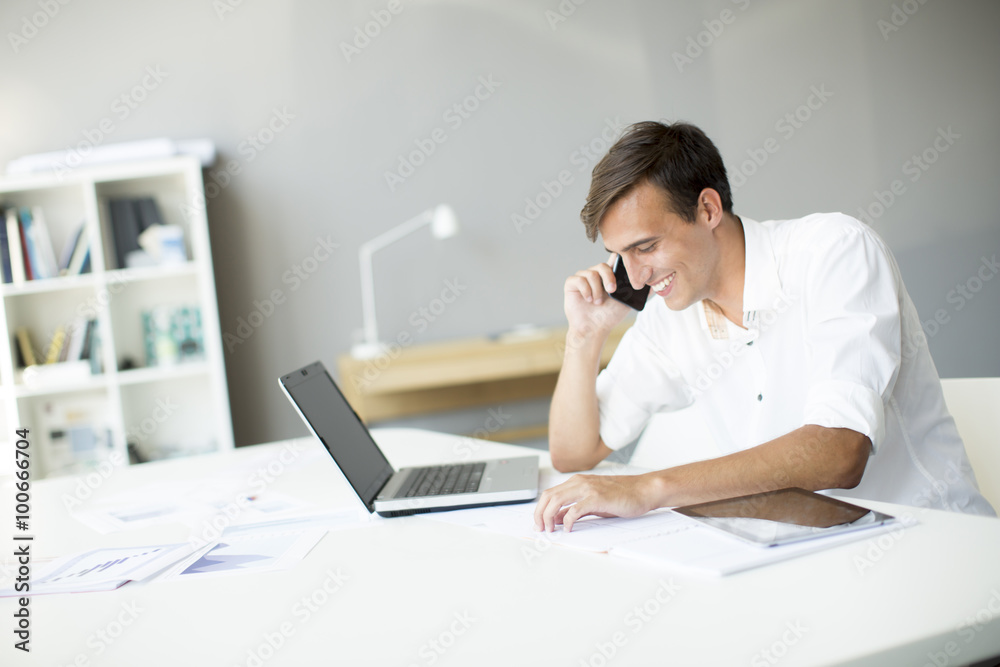 Young man in the office Young man in the office