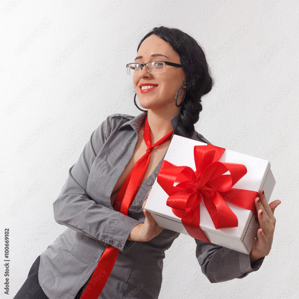 Sexy business lady with gift box with red ribbon Sexy business lady with gift box with red ribbon