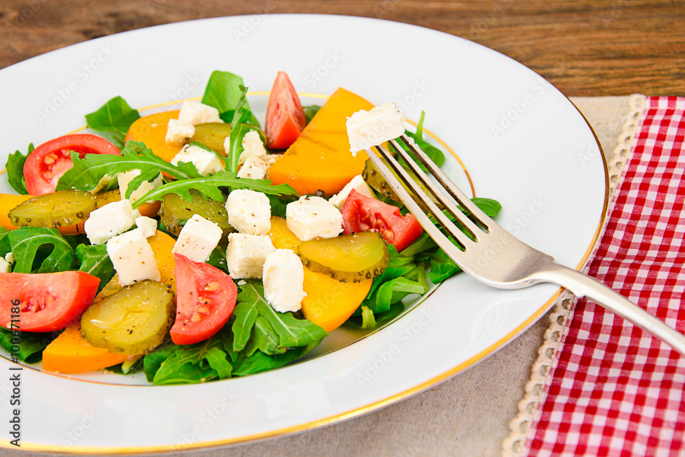 Healthy and Diet Food: Salad, Persimmon, Pickled Cucumber, Tomat