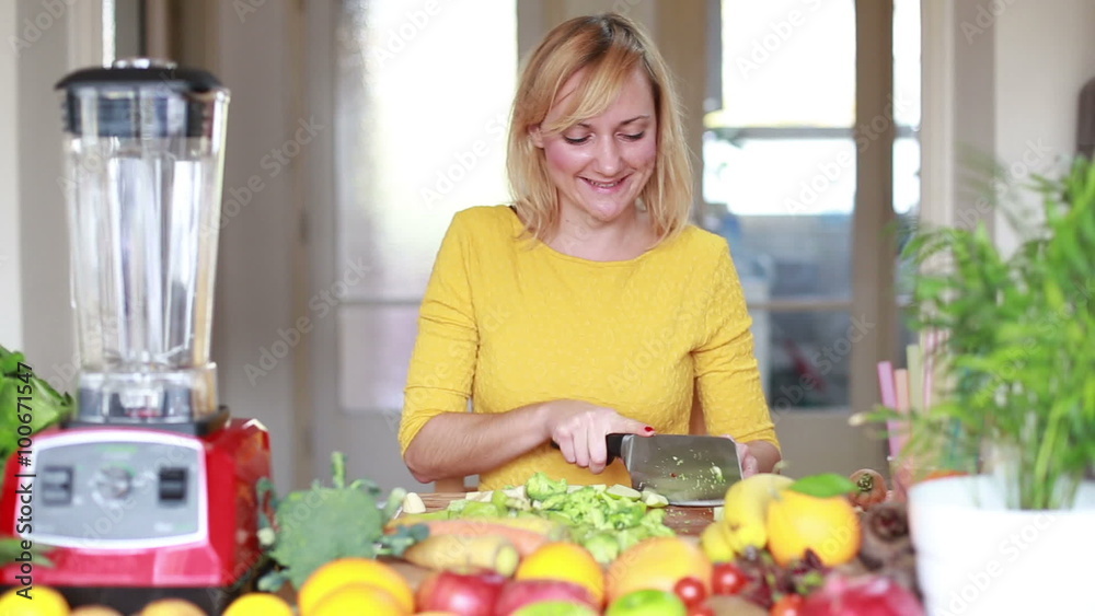 Young woman cutting apple into slices Young woman cutting apple into slices