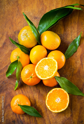 Tangerines on a wooden background