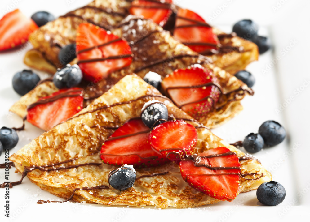 Crepes With Berries and Chocolate topping Crepes With Berries and Chocolate topping