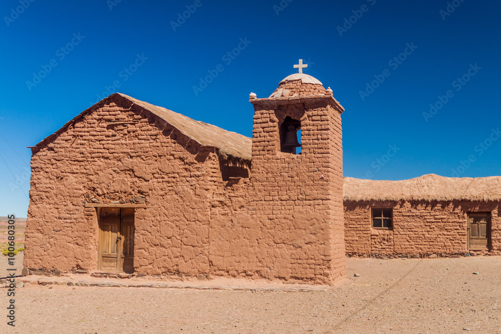 Adobe church in Cerrillos village on bolivian Altiplano