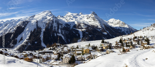 Winter landscape. Alpine village of Gimillan (1800 meters of altitude) in Aosta valley, Cogne,Italy photo