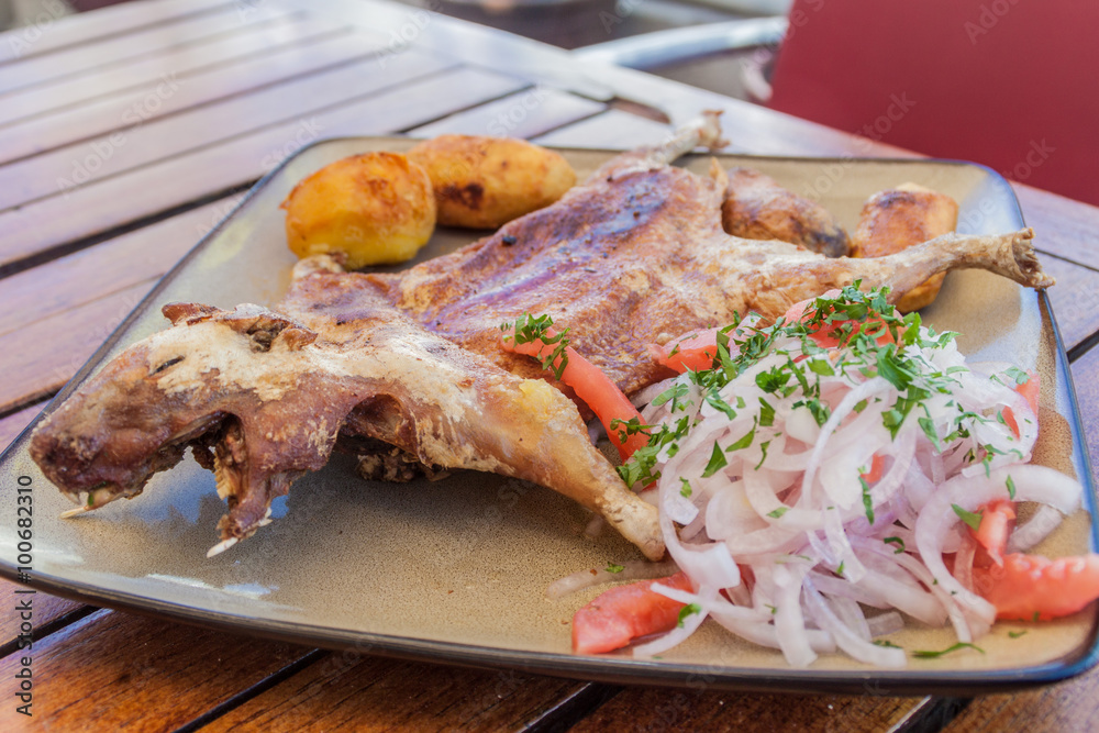 Roasted guinea pig, traditional meal in Peru Roasted guinea pig, traditional meal in Peru