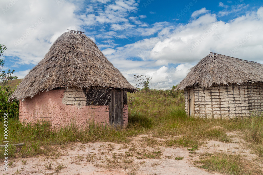Simple houses in an indigenous village in Gran Sabana region of Venezuela Simple houses in an indigenous village in Gran Sabana region of Venezuela