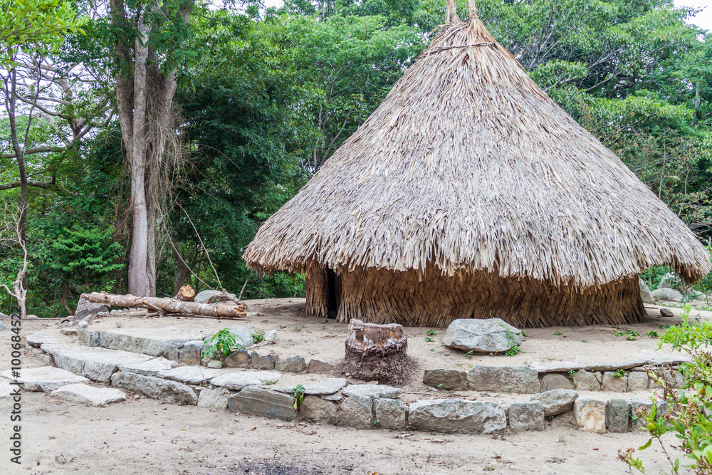 Traditional rustic house of indigenous Kogi people in Tayrona National Park, Colombia Traditional rustic house of indigenous Kogi people in Tayrona National Park, Colombia