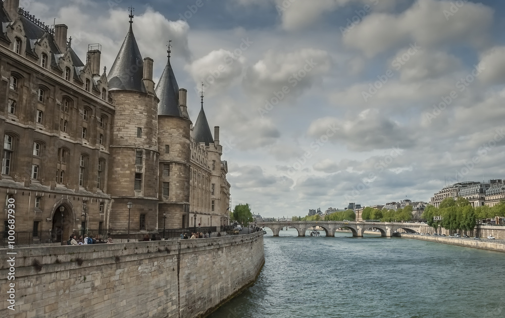 Embankment of the Seine river in historical center of Paris, France