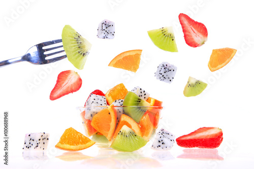 Fototapeta Naklejka Na Ścianę i Meble -  Dragon fruit, kiwi fruit, strawberry and orange