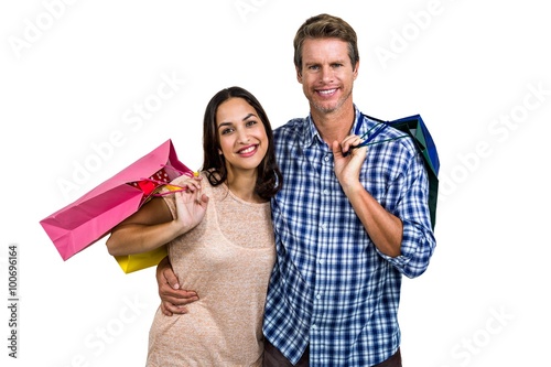 Wallpaper Mural Portrait of cheerful couple with shopping bags Torontodigital.ca