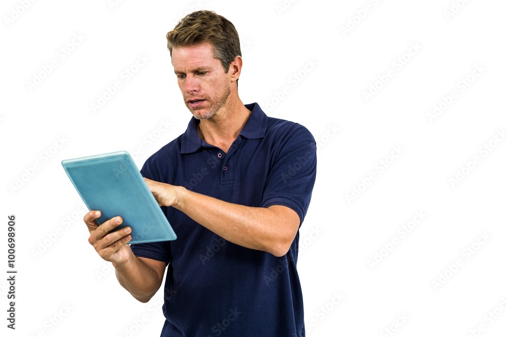Serious man using digital tablet Serious man using digital tablet
