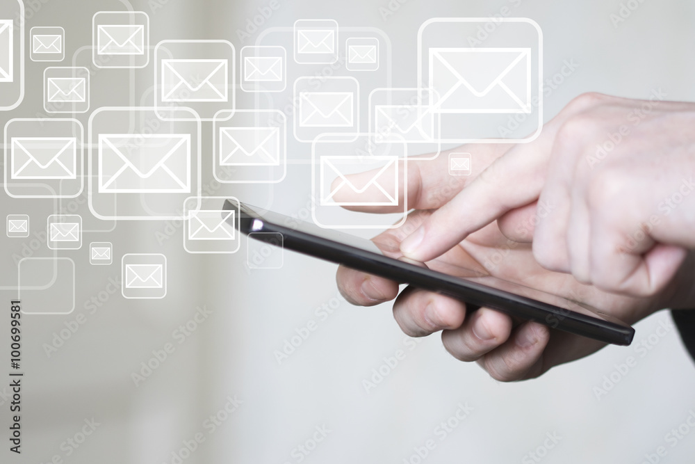 Businessman pushing on cellphone check mail sign Businessman pushing on cellphone check mail sign