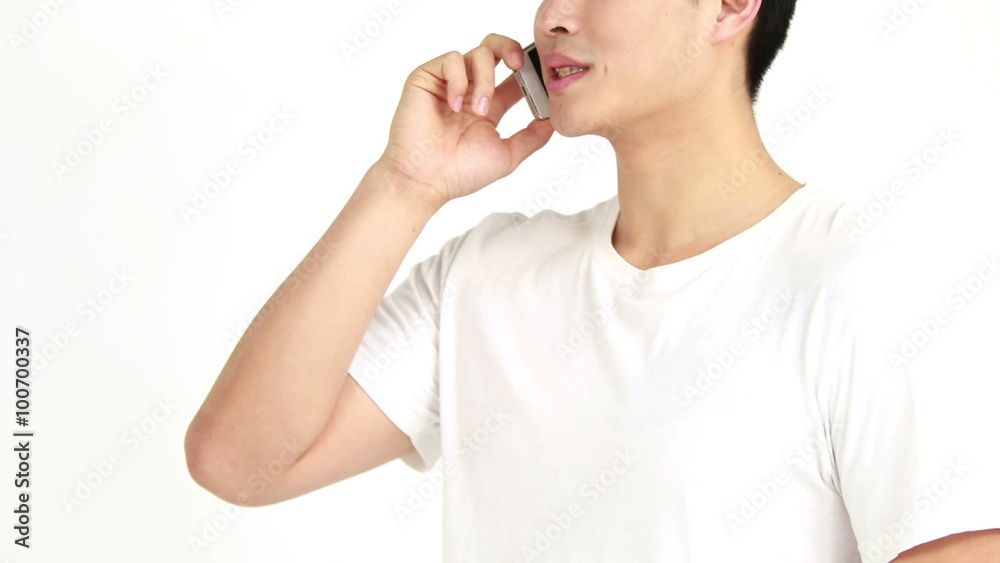 Smiling handsome man having a phone call Smiling handsome man having a phone call