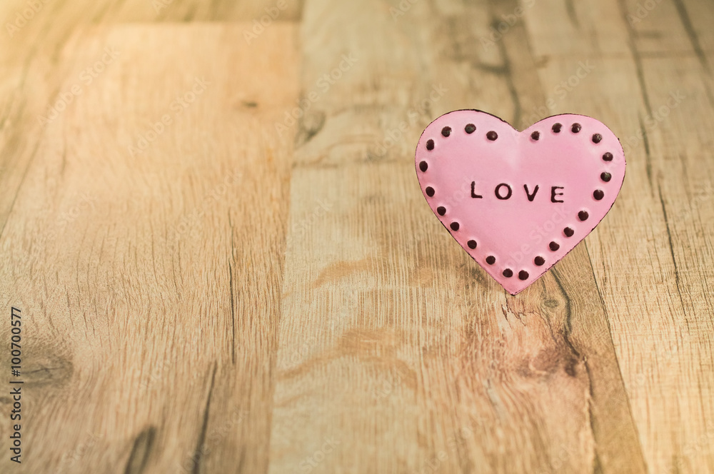 Valentines Day heart with inscription/Pink heart with place for text on the wooden background Valentines Day heart with inscription/Pink heart with place for text on the wooden background