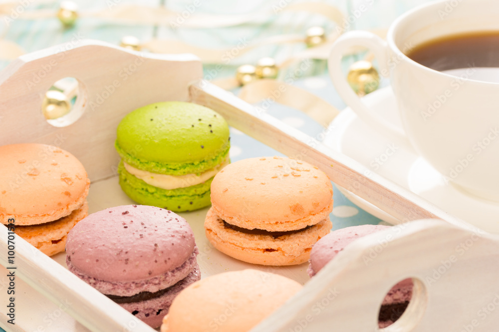 macaroons on wooden plate