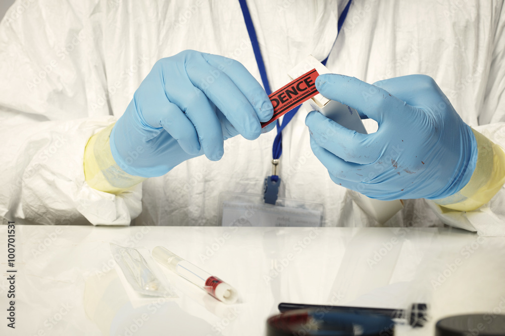 Fototapeta premium Sealing of DNA collector swab in box
