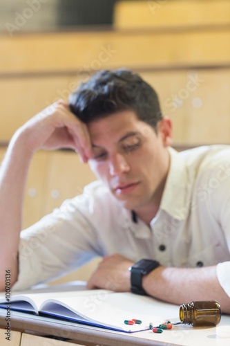 Anxious male student during exam