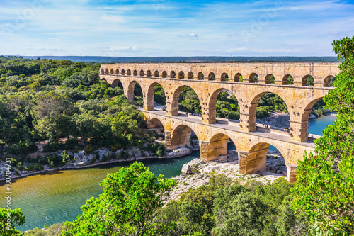 Fototapeta Three-tiered aqueduct Pont du Gard and natural park