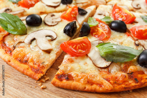 Sliced Pizza with mushrooms and vegetables