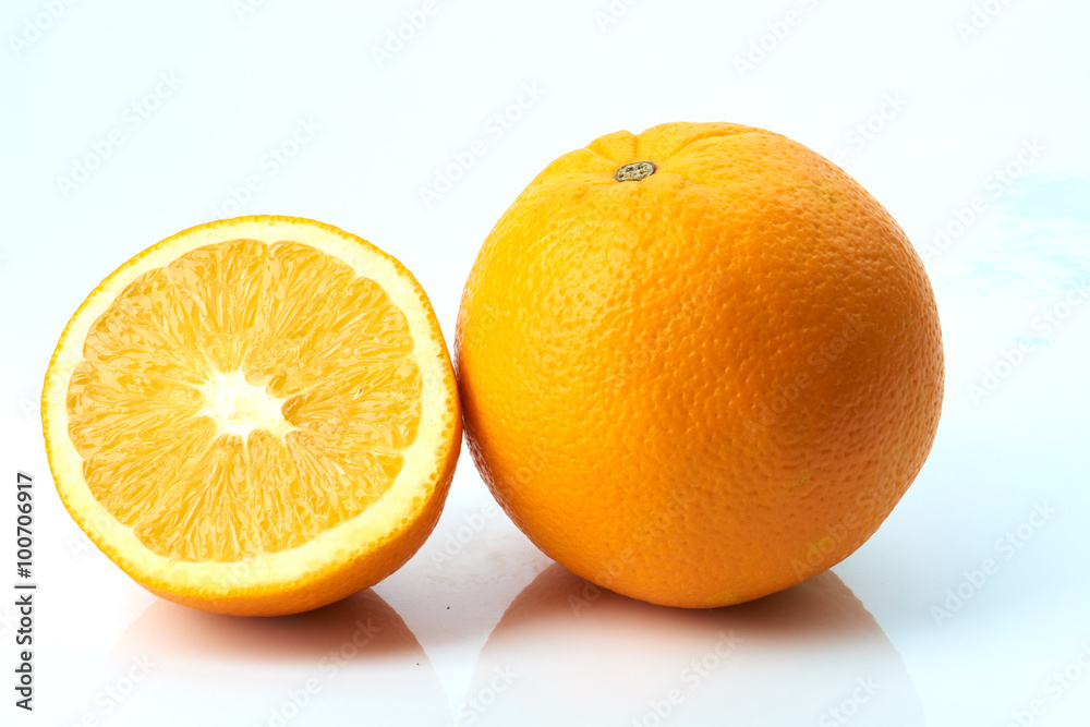 Orange with half isolated on white Orange with half isolated on white