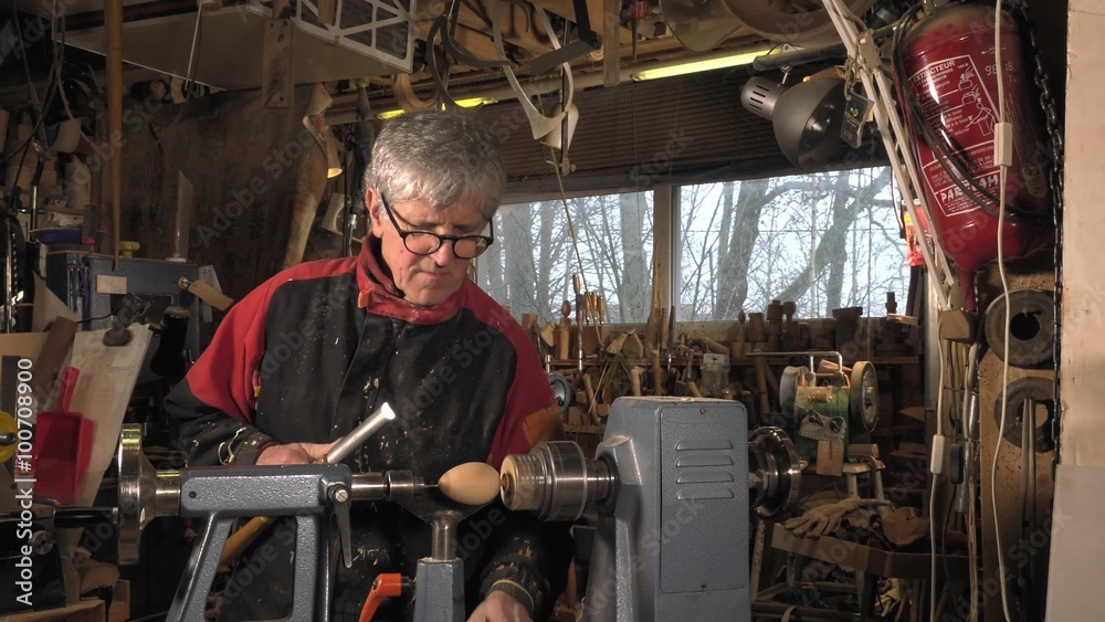wood turner cutting shapes in wood Stock Video Adobe Stock