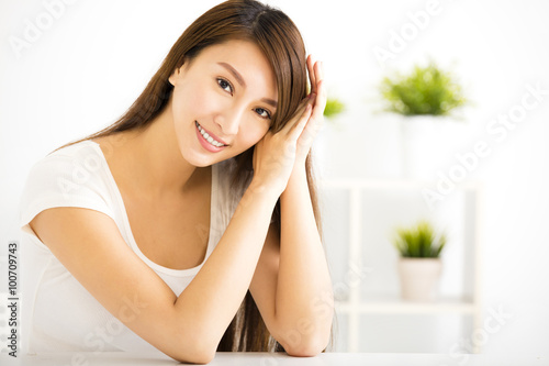 young smiling woman in living room