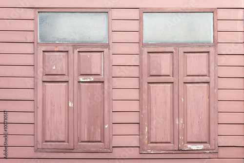 the couple of red wood window in the vintage style