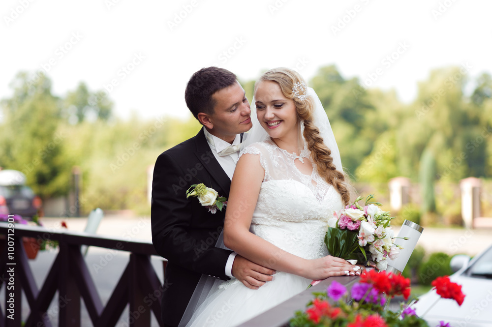 Shining with happiness. Shot of a young loving couple posing together on their wedding day soft focus Shining with happiness. Shot of a young loving couple posing together on their wedding day soft focus
