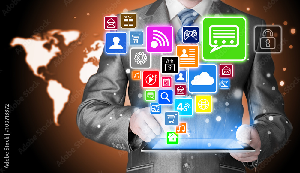 Business man using tablet PC with social media icon set Business man using tablet PC with social media icon set