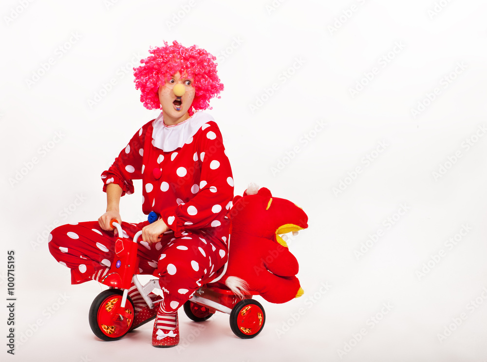 Fototapeta premium Funny clown in pink wig