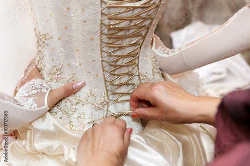 Fototapeta the lacing of the corset bridesmaid dresses.