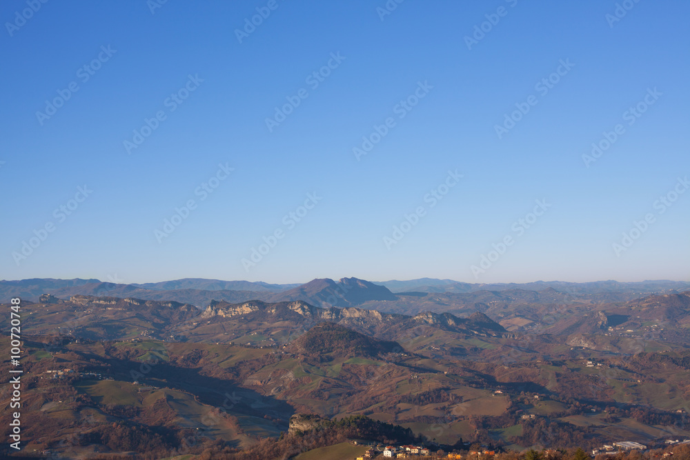 Panorama of the mountains, the countryside and sky.