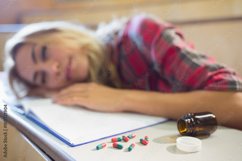 Anxious female student during class Anxious female student during class