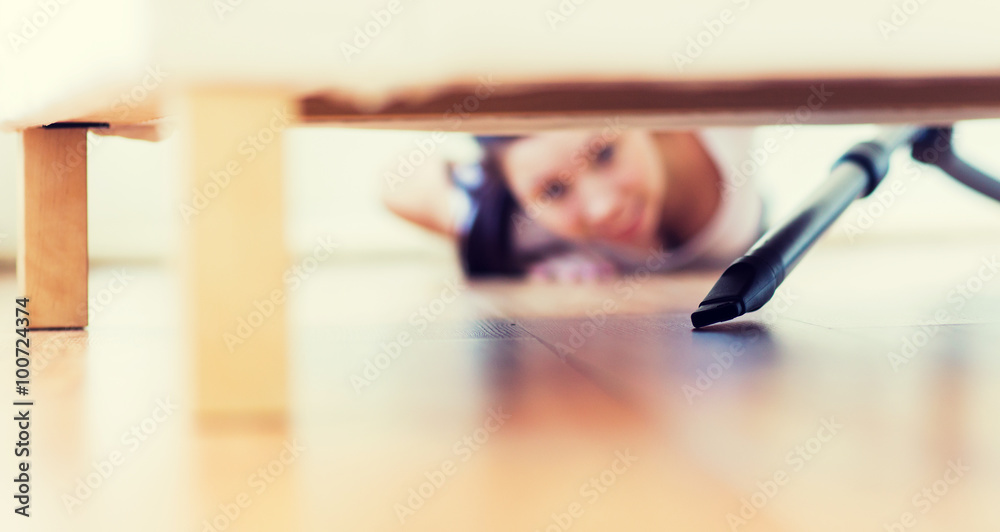 close up of woman with vacuum cleaner at home close up of woman with vacuum cleaner at home