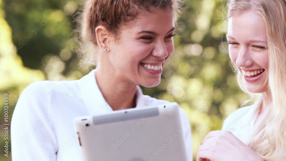 Hip friends using tablet Hip friends using tablet