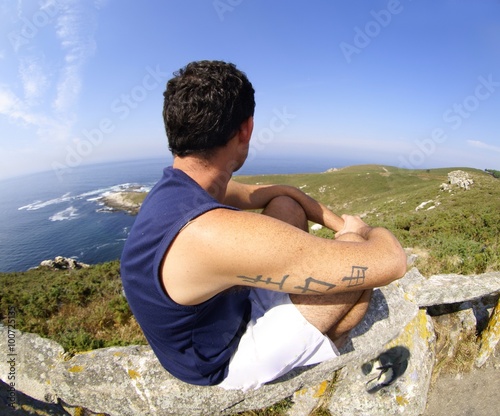 Canvas Print Man looking nature on the islands of Galicia Spain